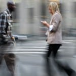 Diverse people walking motion blur